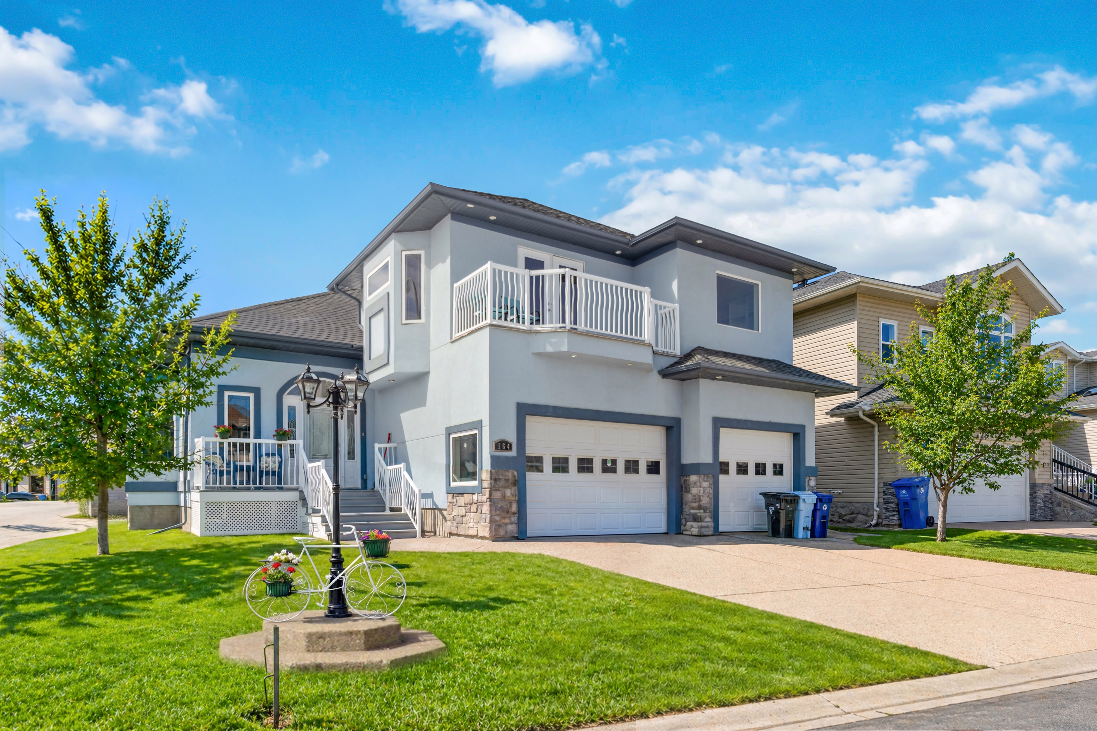 Exterior digitally transformed from snow to green lawn